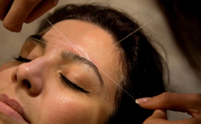 Eyebrow threading service at Hollywood Eyebrow Salon